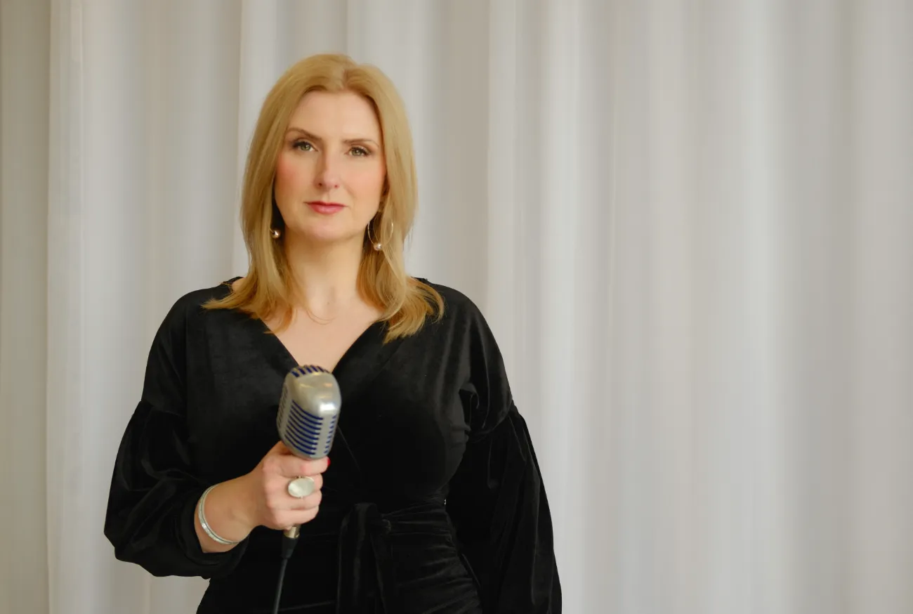 Professional funeral singer providing respectful live music at memorial service and crematorium ceremony